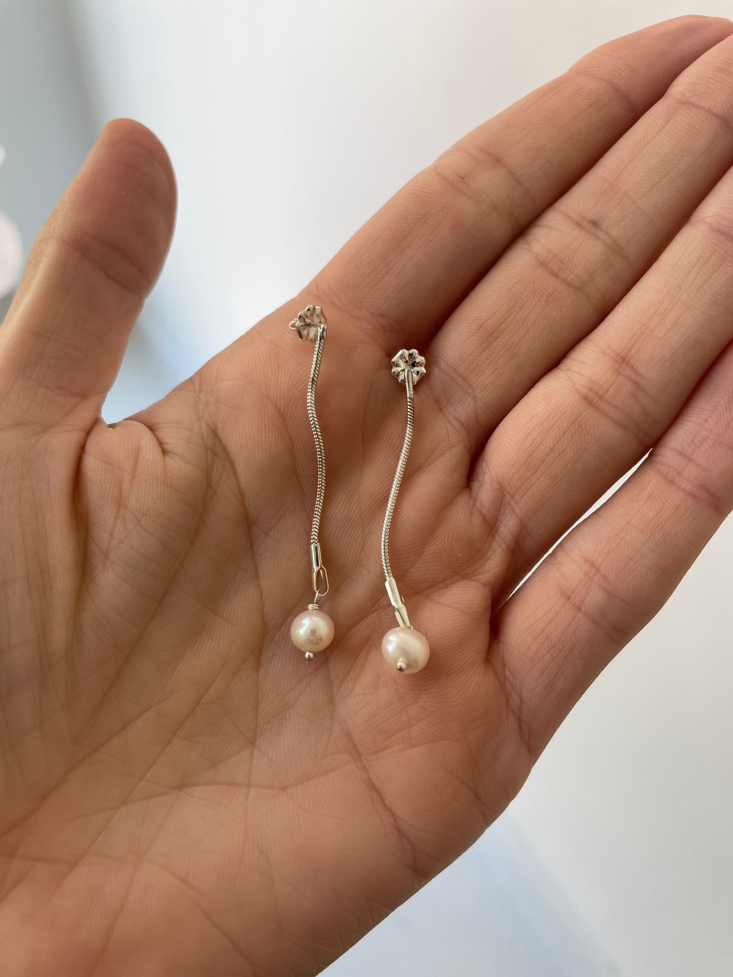 short pearl drop studs