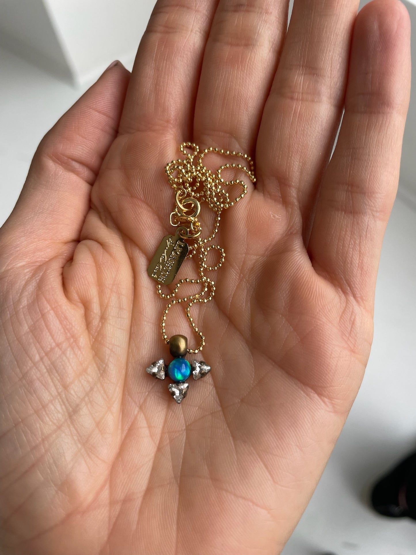 a lionette mars necklace with swarovski crystal, simulated crystal opal, 14k gold vermeil