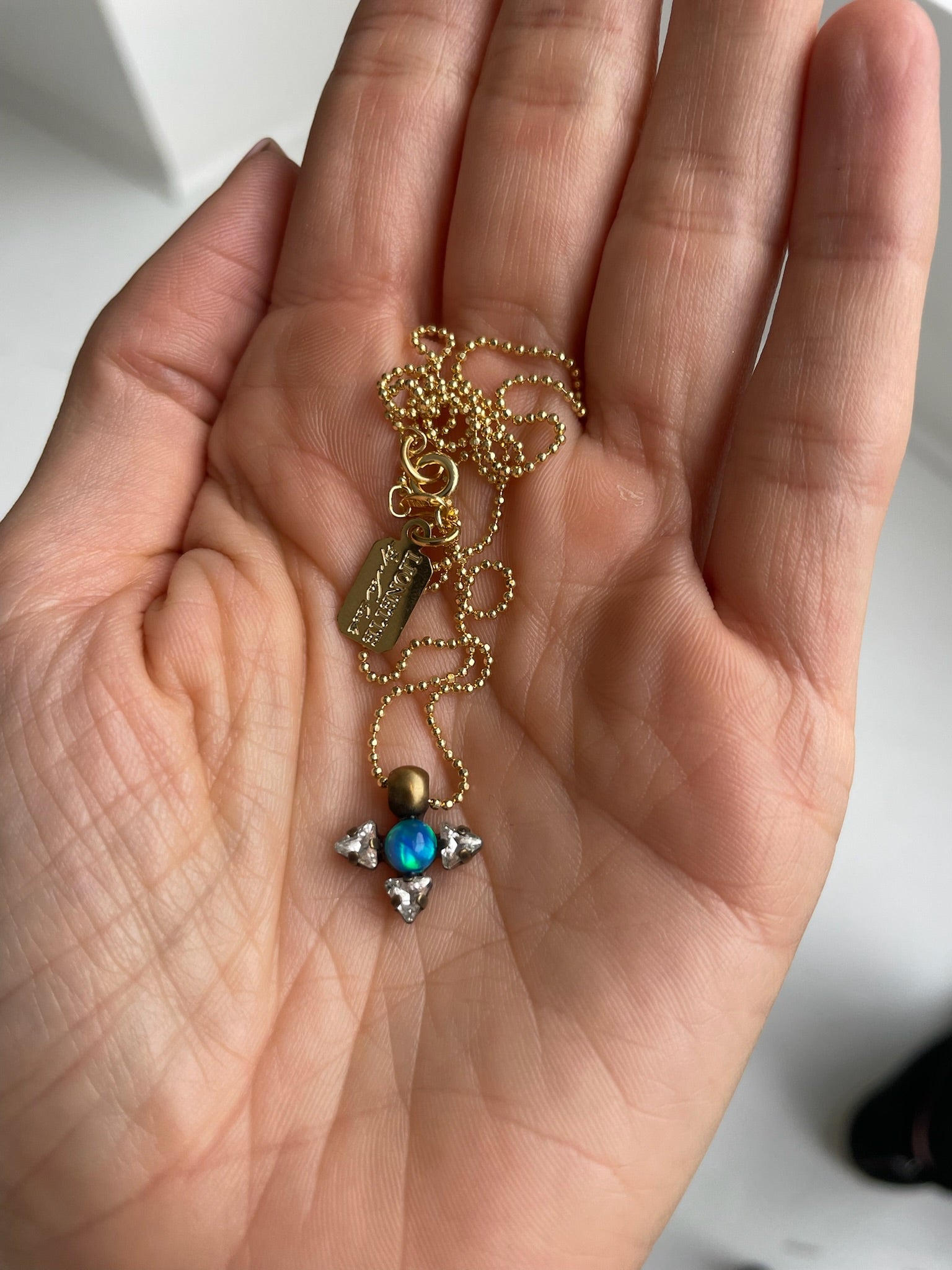 a lionette mars necklace with swarovski crystal, simulated crystal opal, 14k gold vermeil