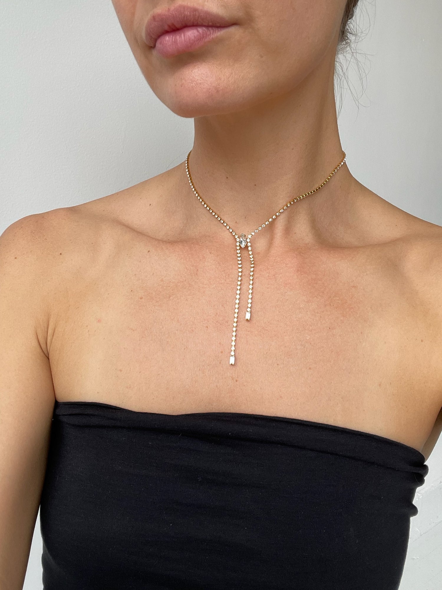a lionette arzua lariat necklace with swarovski crystal, 14k gold plated brass
