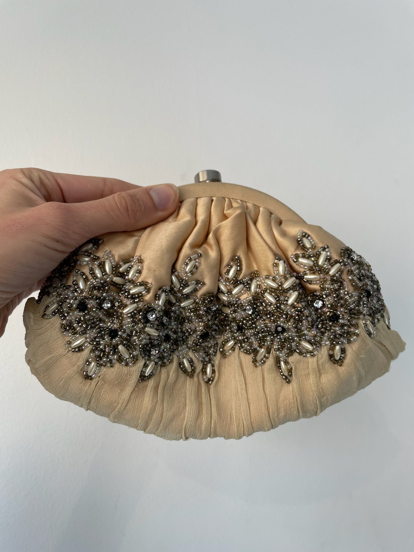 a vintage shell shaped purse by santi