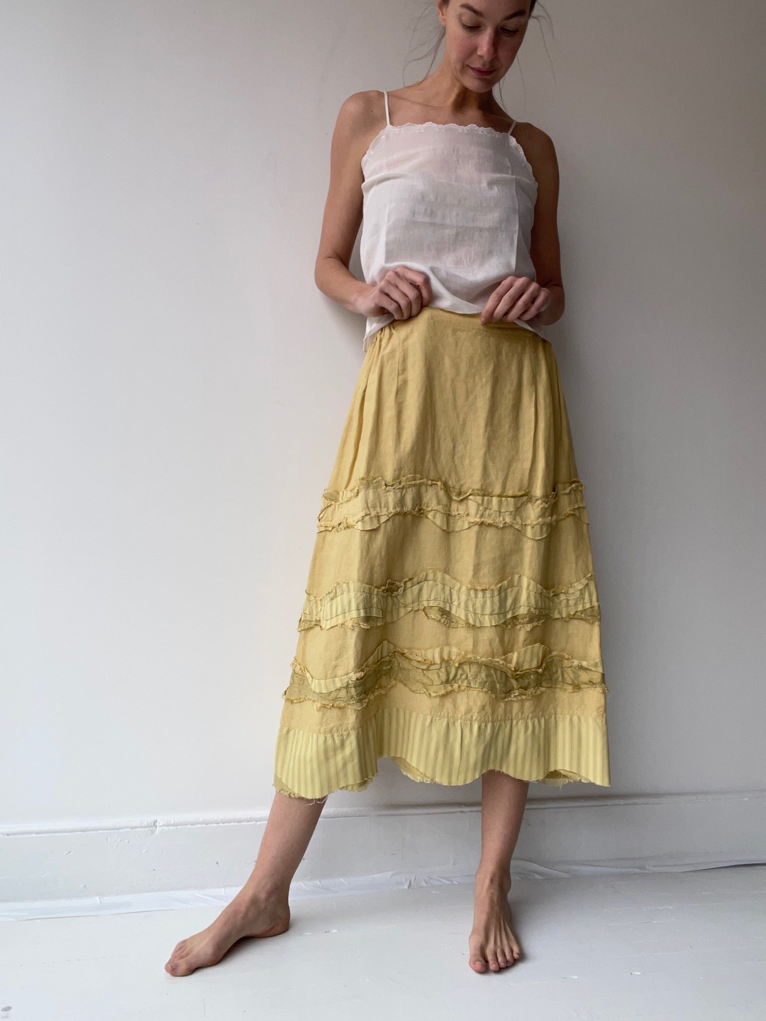 a preloved yellow skirt by krista larson 100