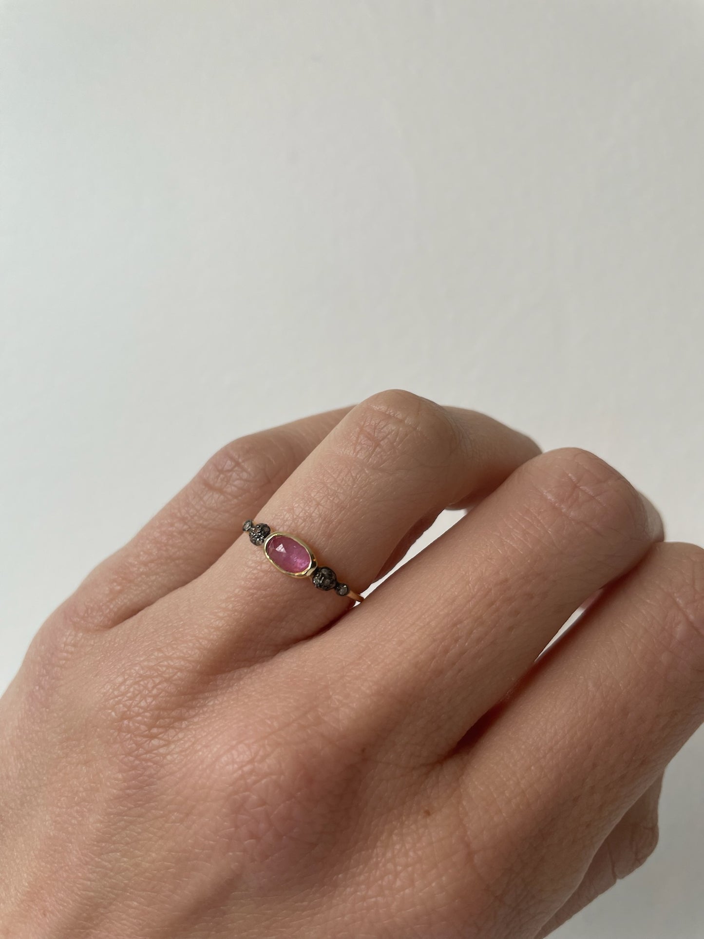 size 6.5 gold dainty ring with oval pink sapphire 