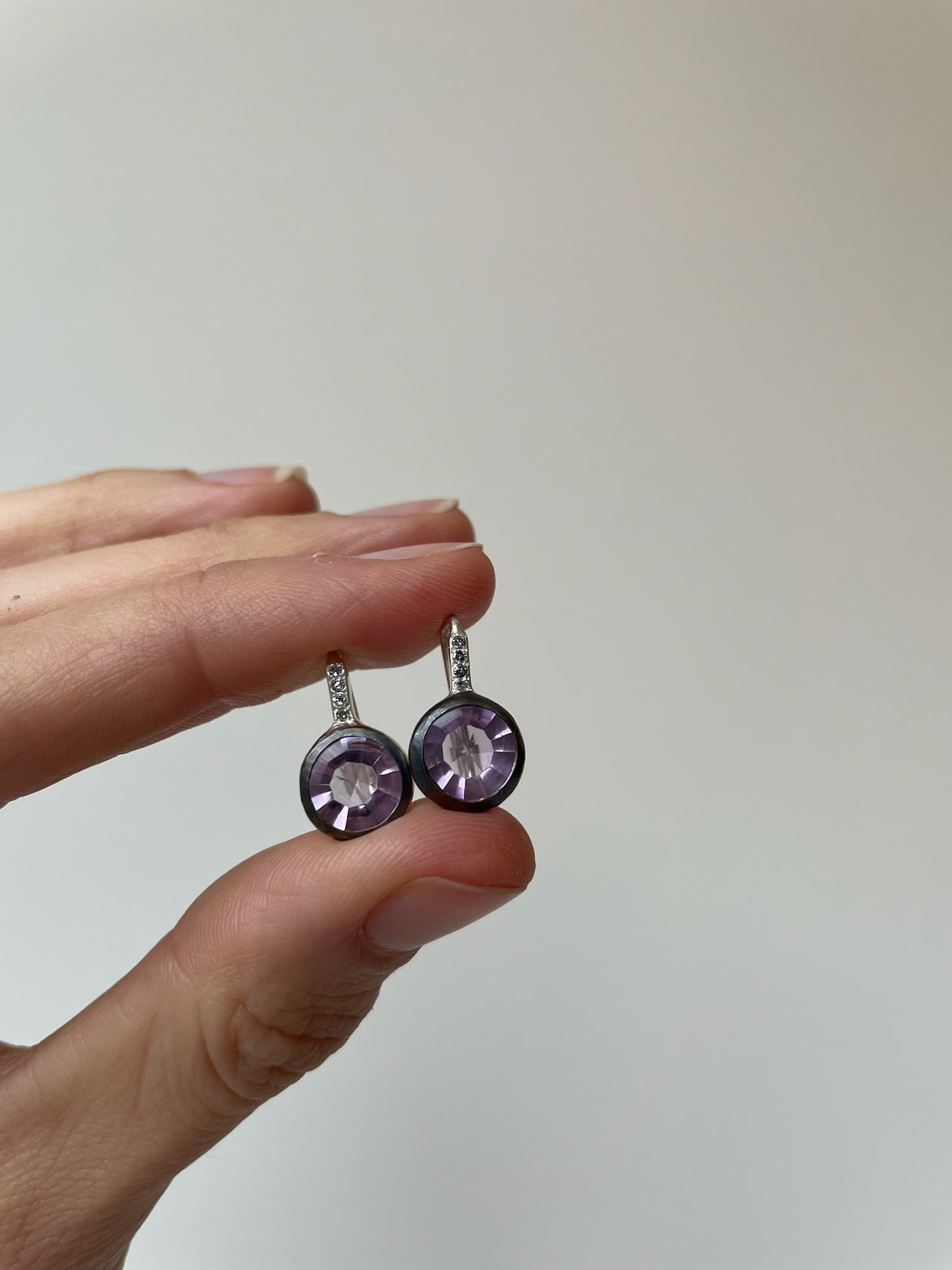 Beautiful amethyst earrings with icy grey diamonds set in sterling silver 