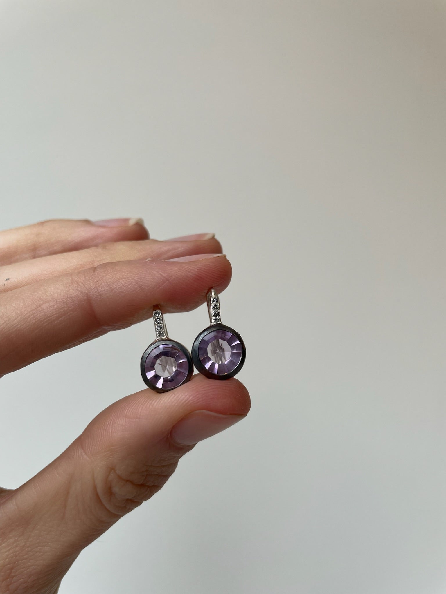 Beautiful amethyst earrings with icy grey diamonds set in sterling silver 