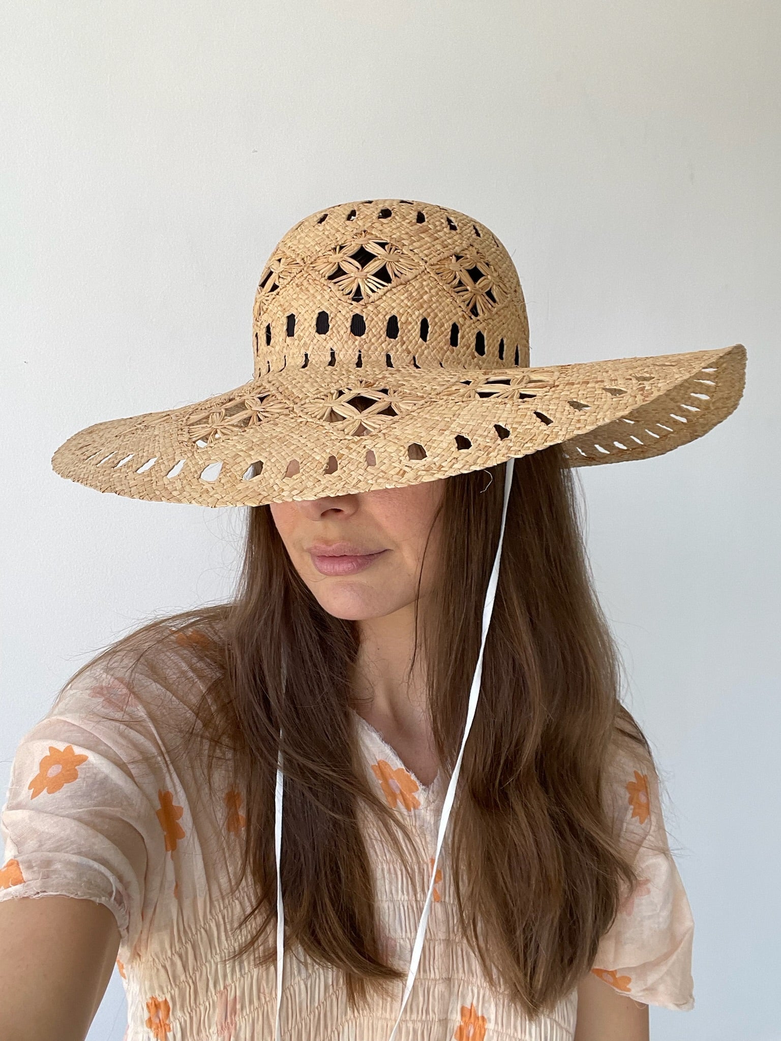 a chisaki kaze flower hat with seagrass