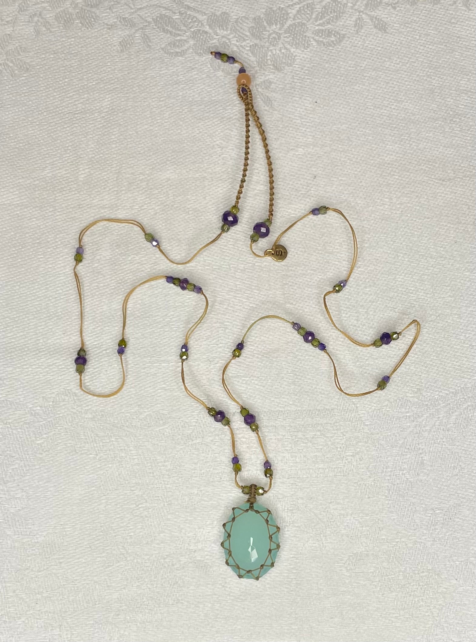 a calcedoine short tibetan necklace by sharing