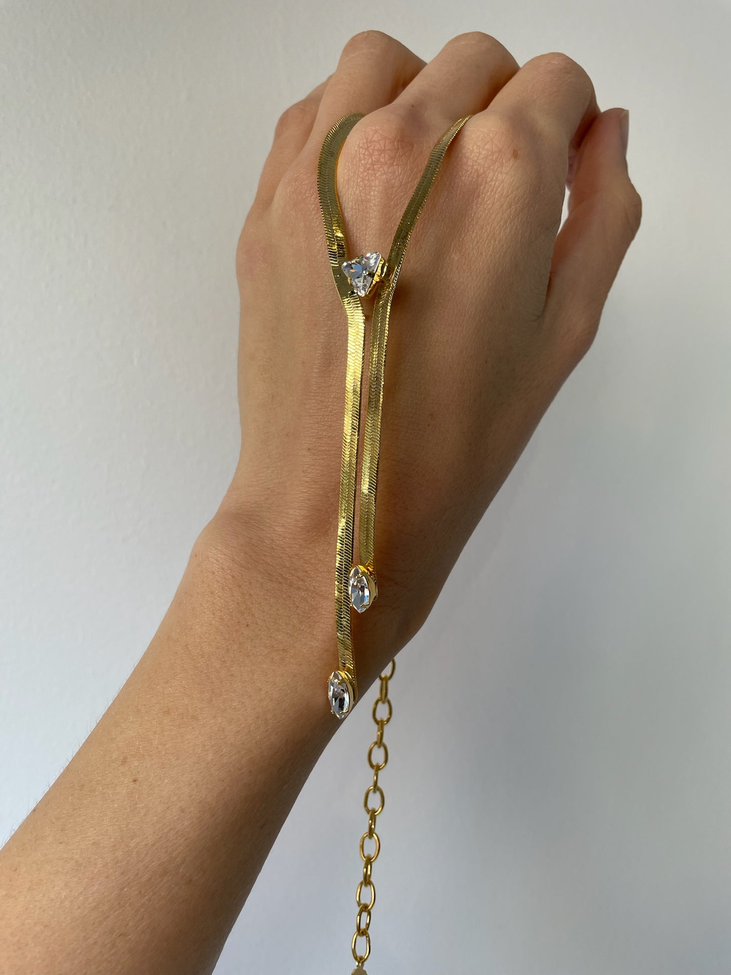 Gold lariat style necklace made of 14k gold plated brass and swarovdski crystals