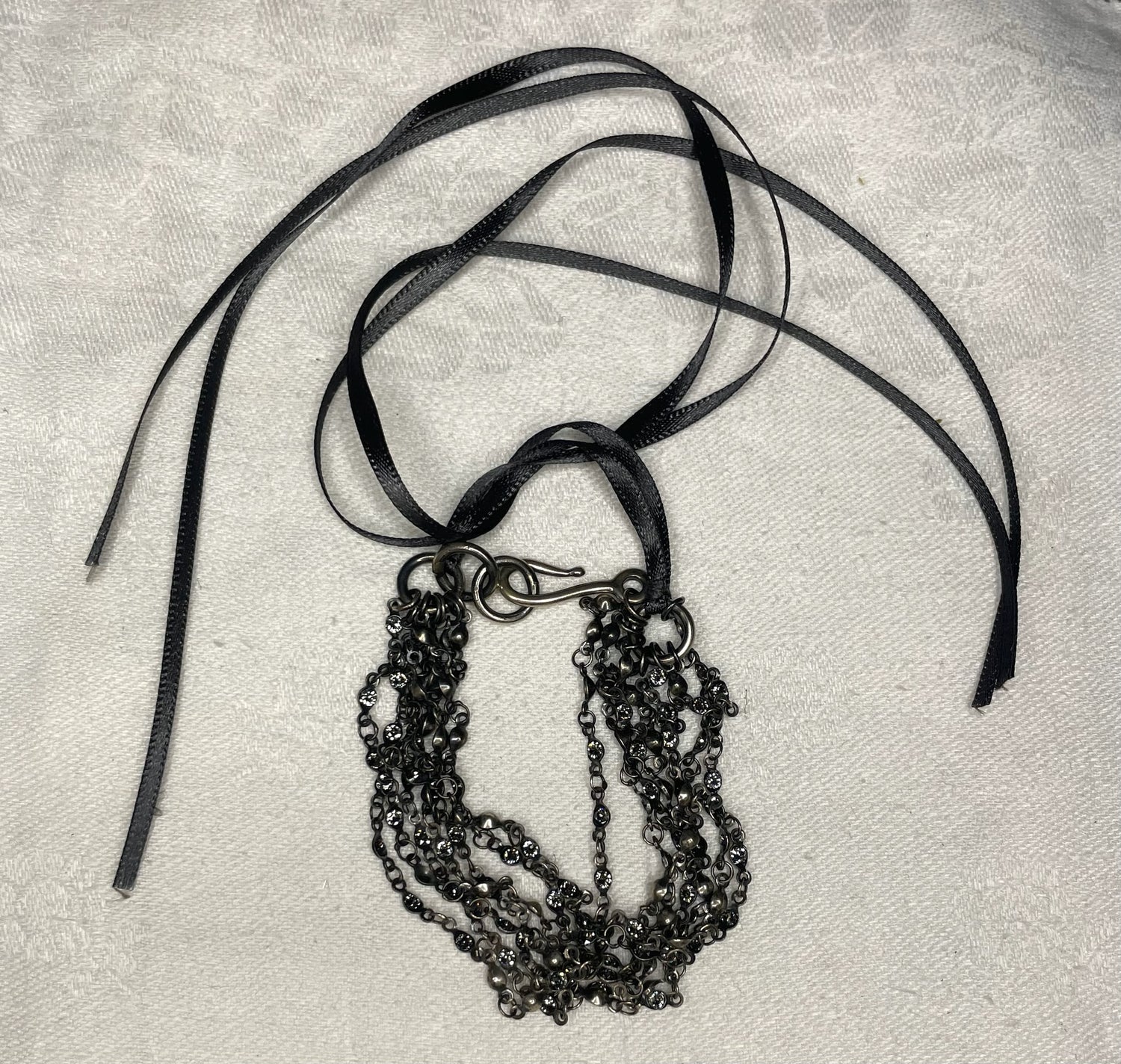 a goti ribbon bracelet in sterling silver, leather