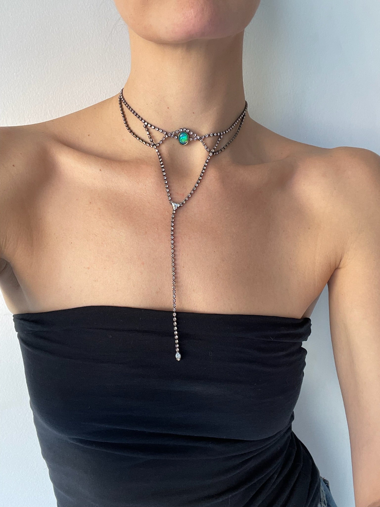 Choker necklace featuring plated brass chain covered in swarovski crystals, opalite