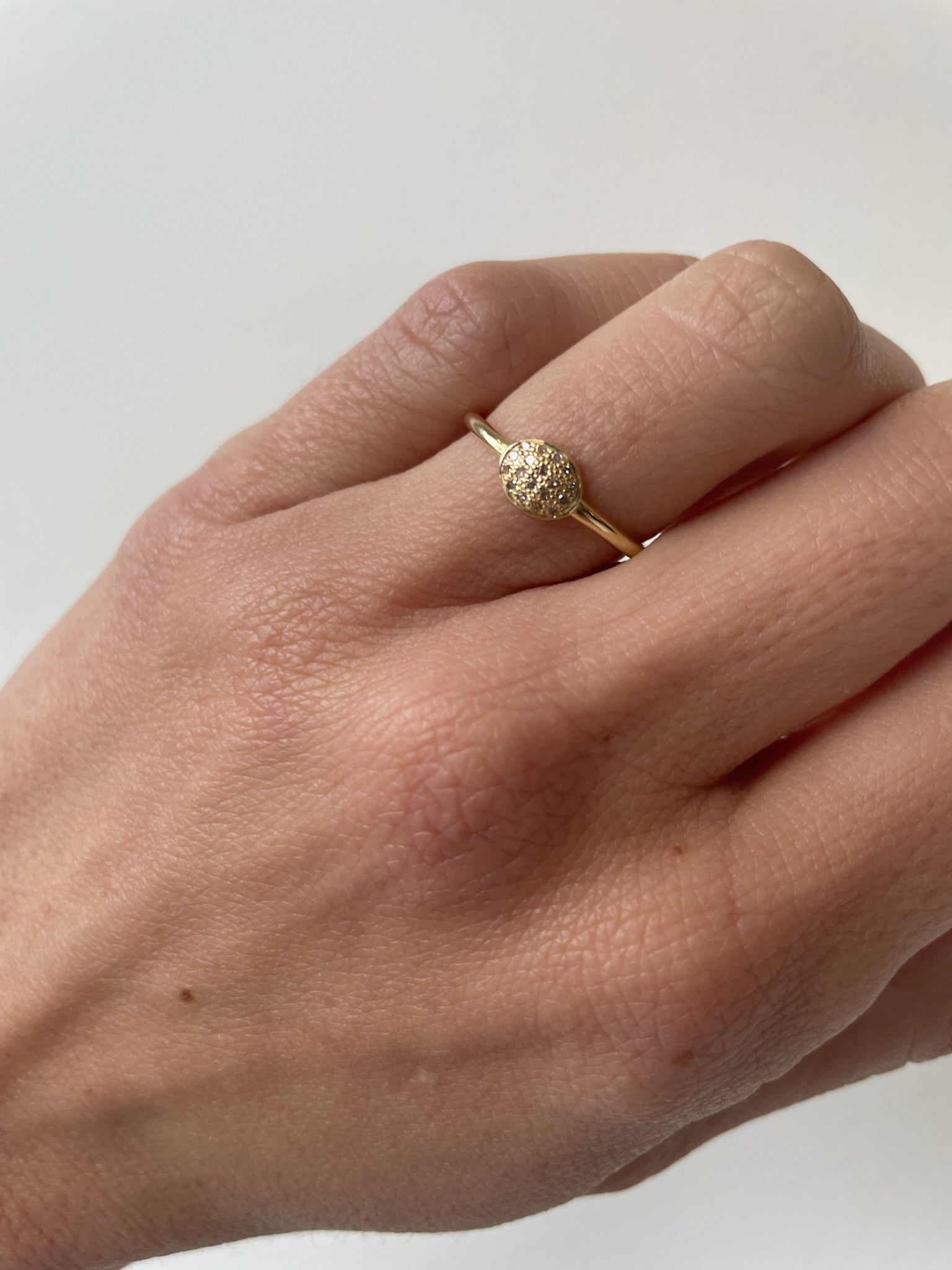 Dainty size 6.5 gold ring with eighteen small diamonds 