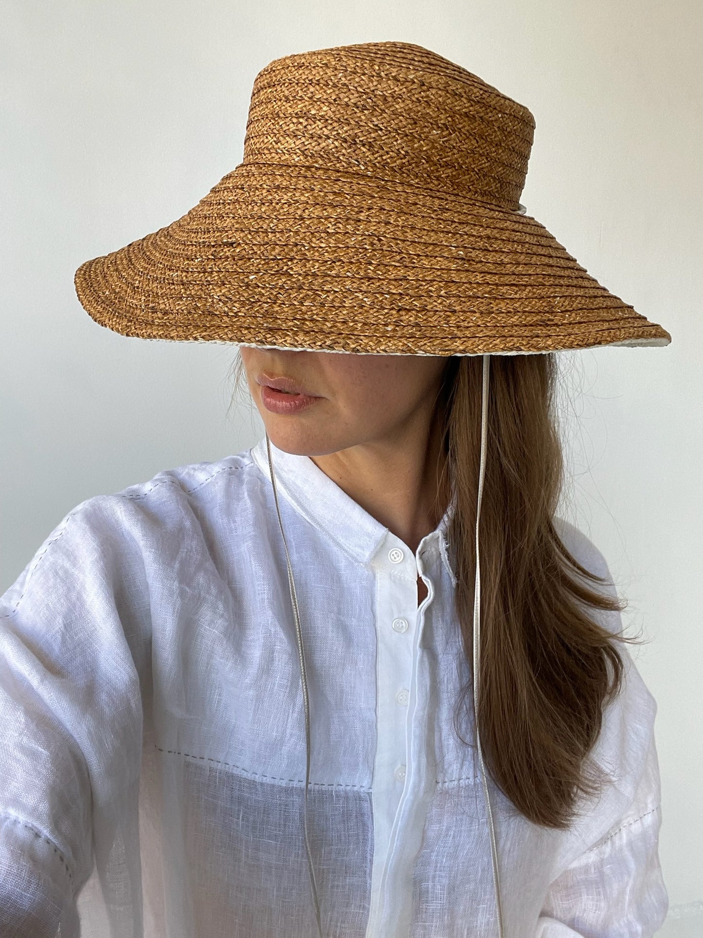 a chisaki ameri hat with recycled paper/polyester blend