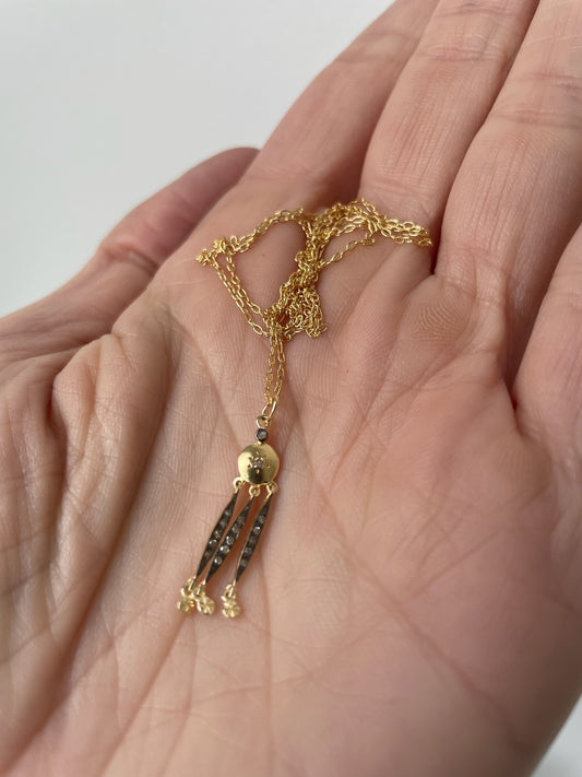 Gold necklace with gold and diamond dangles