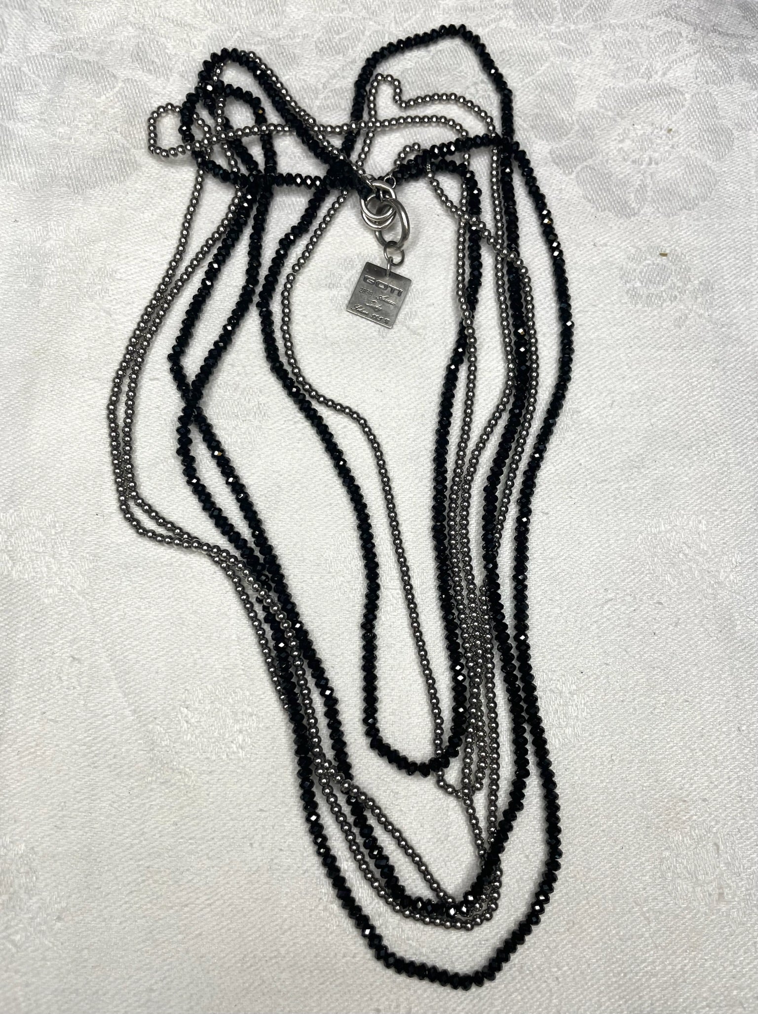 a goti multi strand necklace with style number cn1282