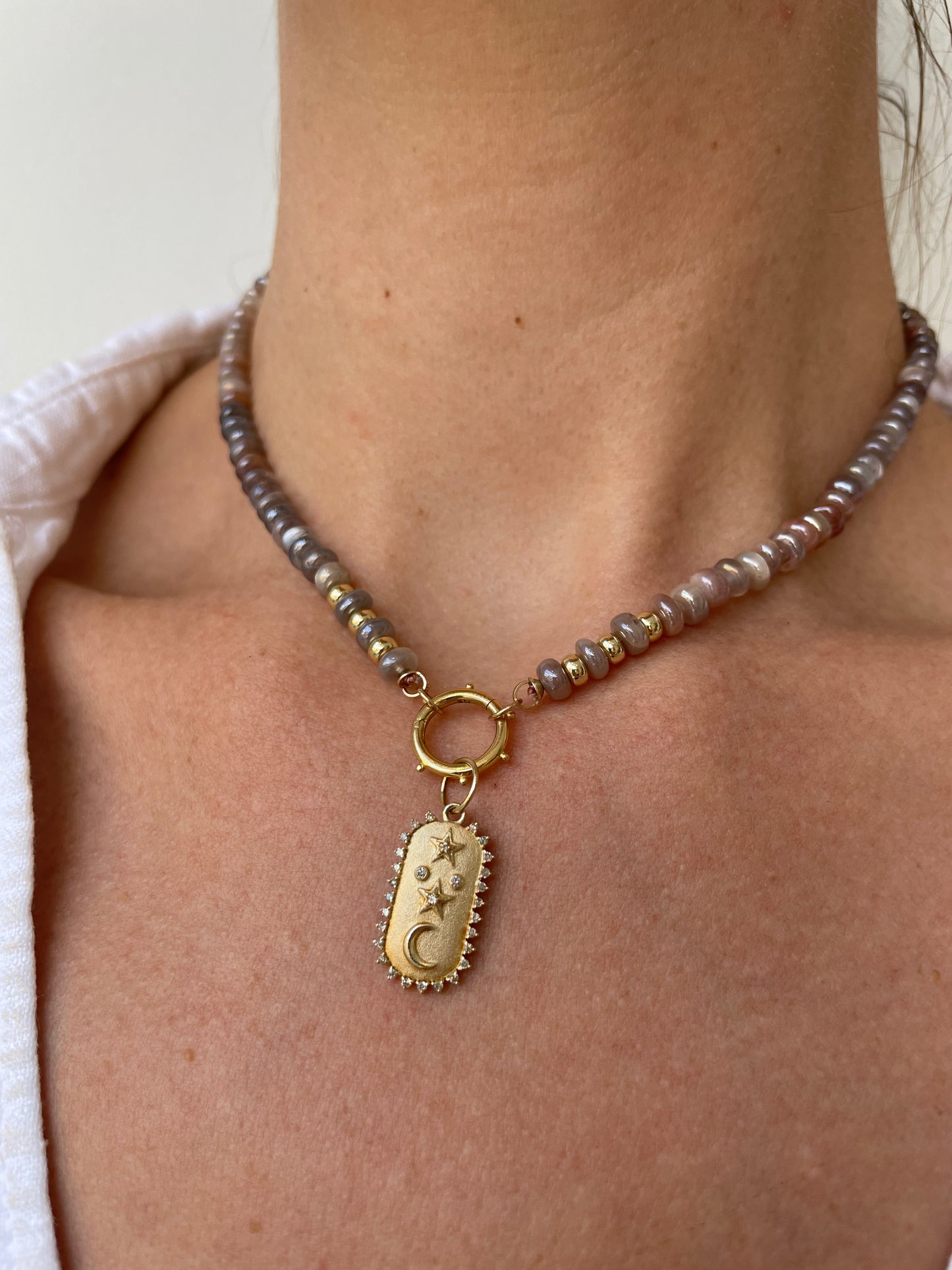 a moon and stars necklace