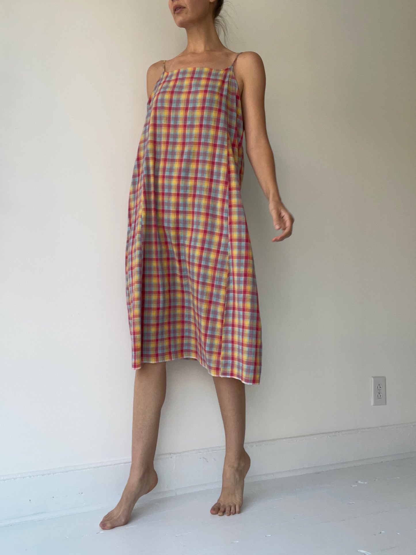 a preloved plaid slip dress by injiri 100