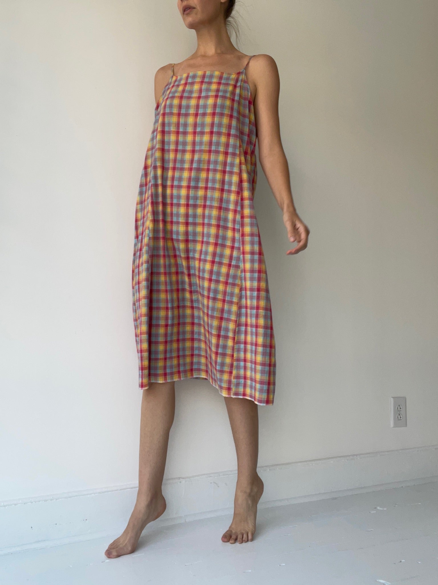 a preloved plaid slip dress by injiri 100