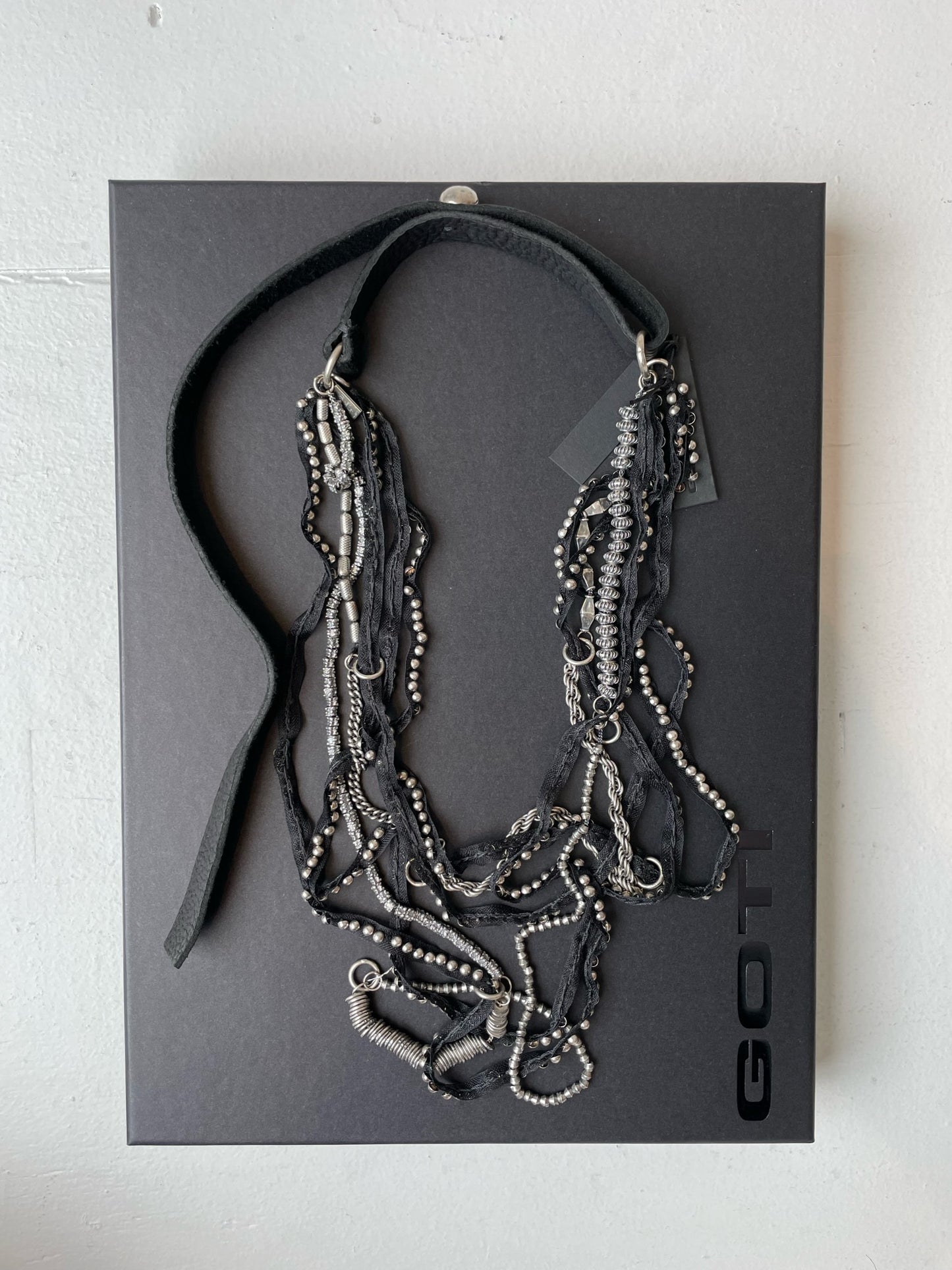 a goti long multi necklace