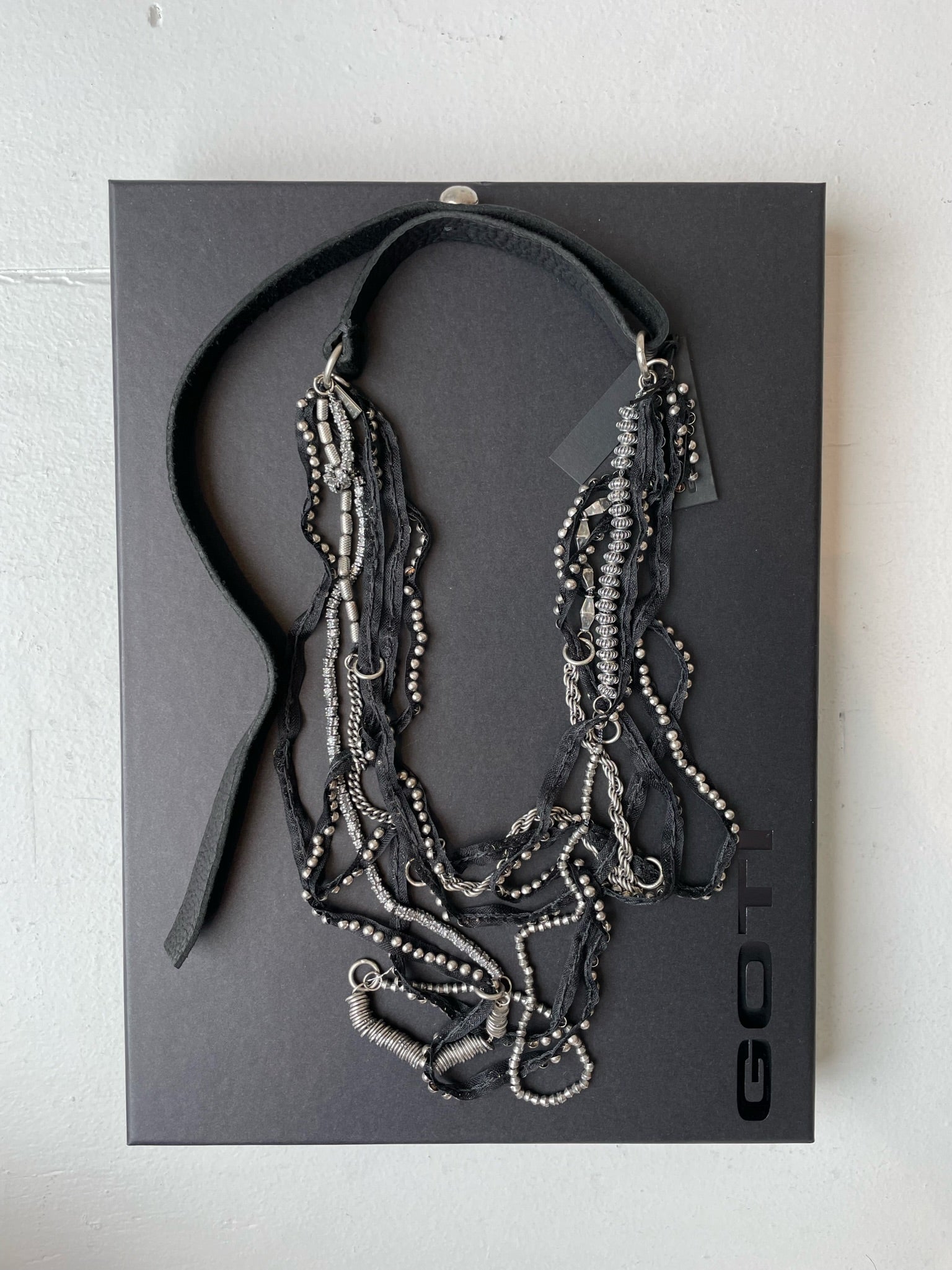 a goti long multi necklace