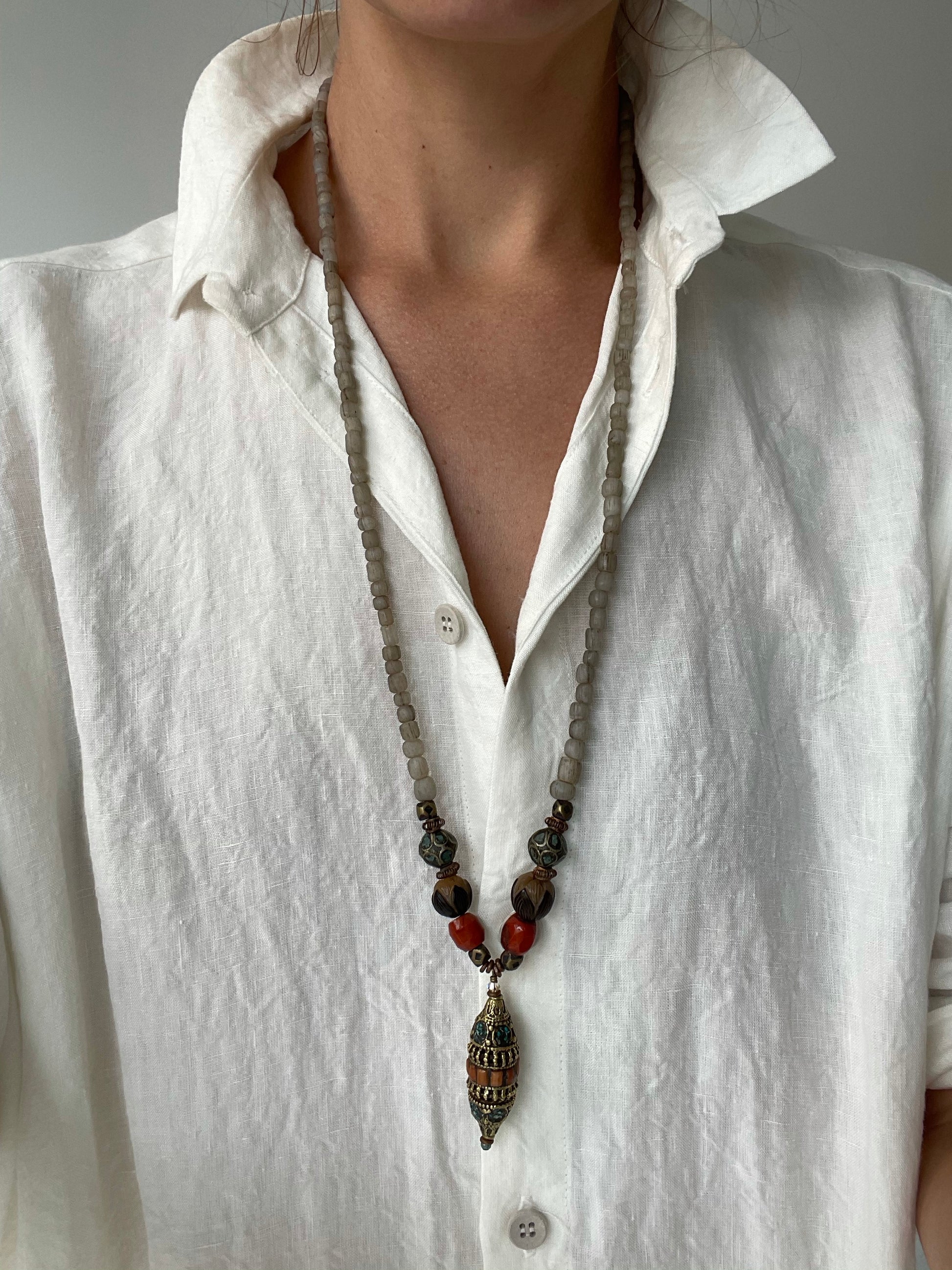 a long nepal coral necklace by heather haase