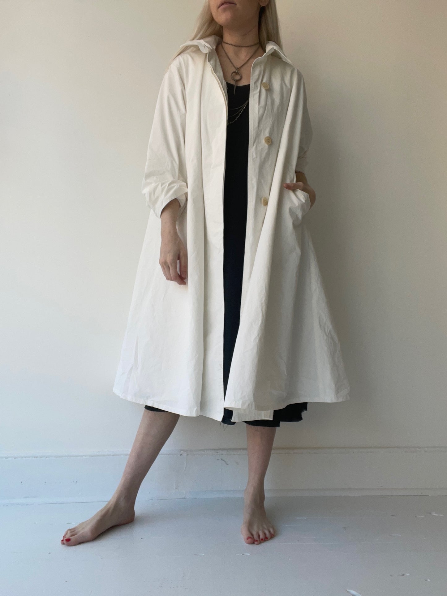 an uplift coat by aequamente white