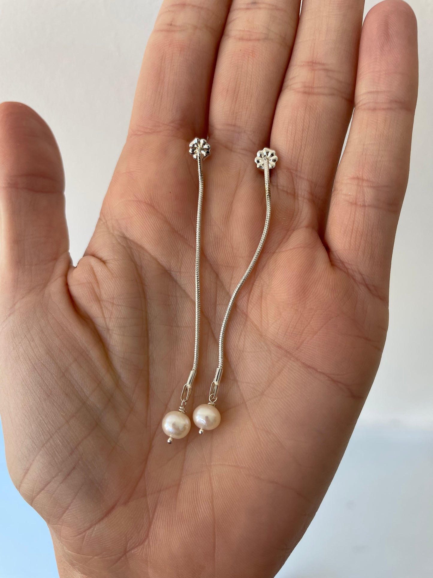 a long pearl drop studs earrings by kiersten crowley sterling silver