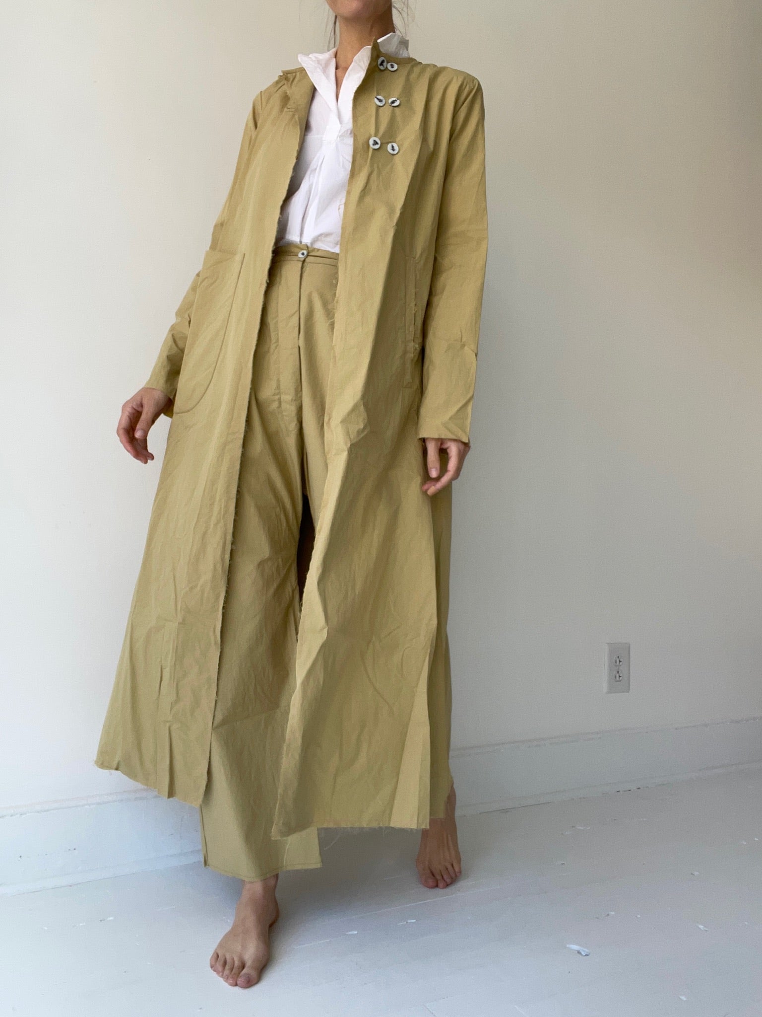 a back pleat coat by sula 69