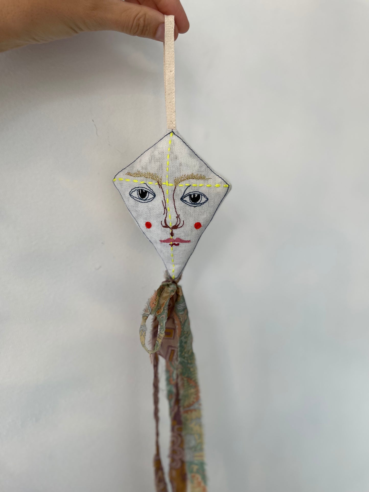 a kite lavender ornament with lovingly made by hand